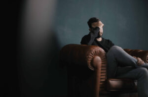 Man sitting in a leather chair