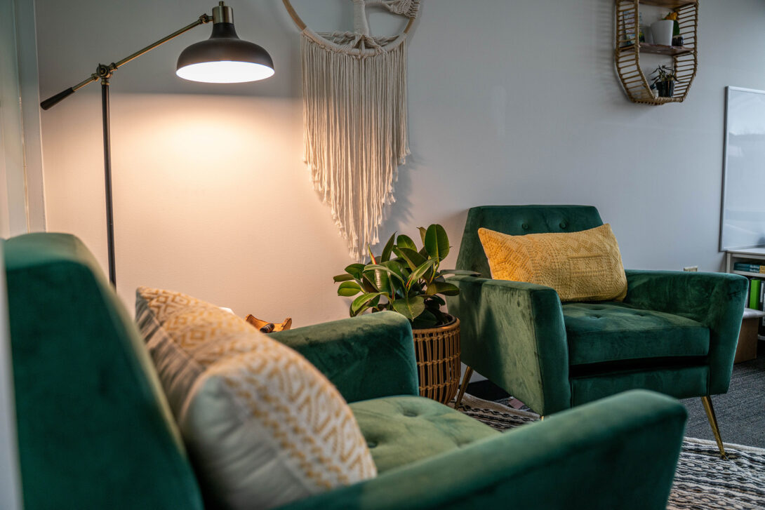 Close up of peaceful talking are with green chairs