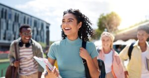 happy young woman with school friends